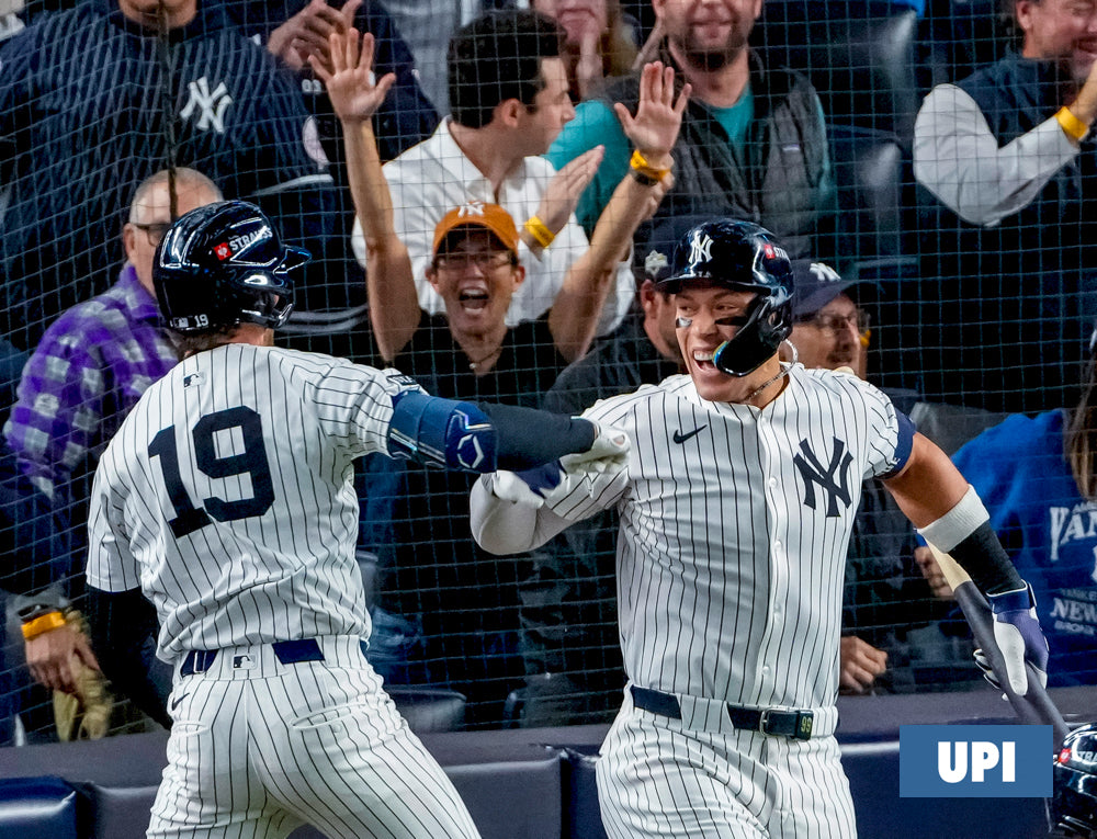 2025-10-08 Judge celebrates with Ryan McMahon 25RFS63952