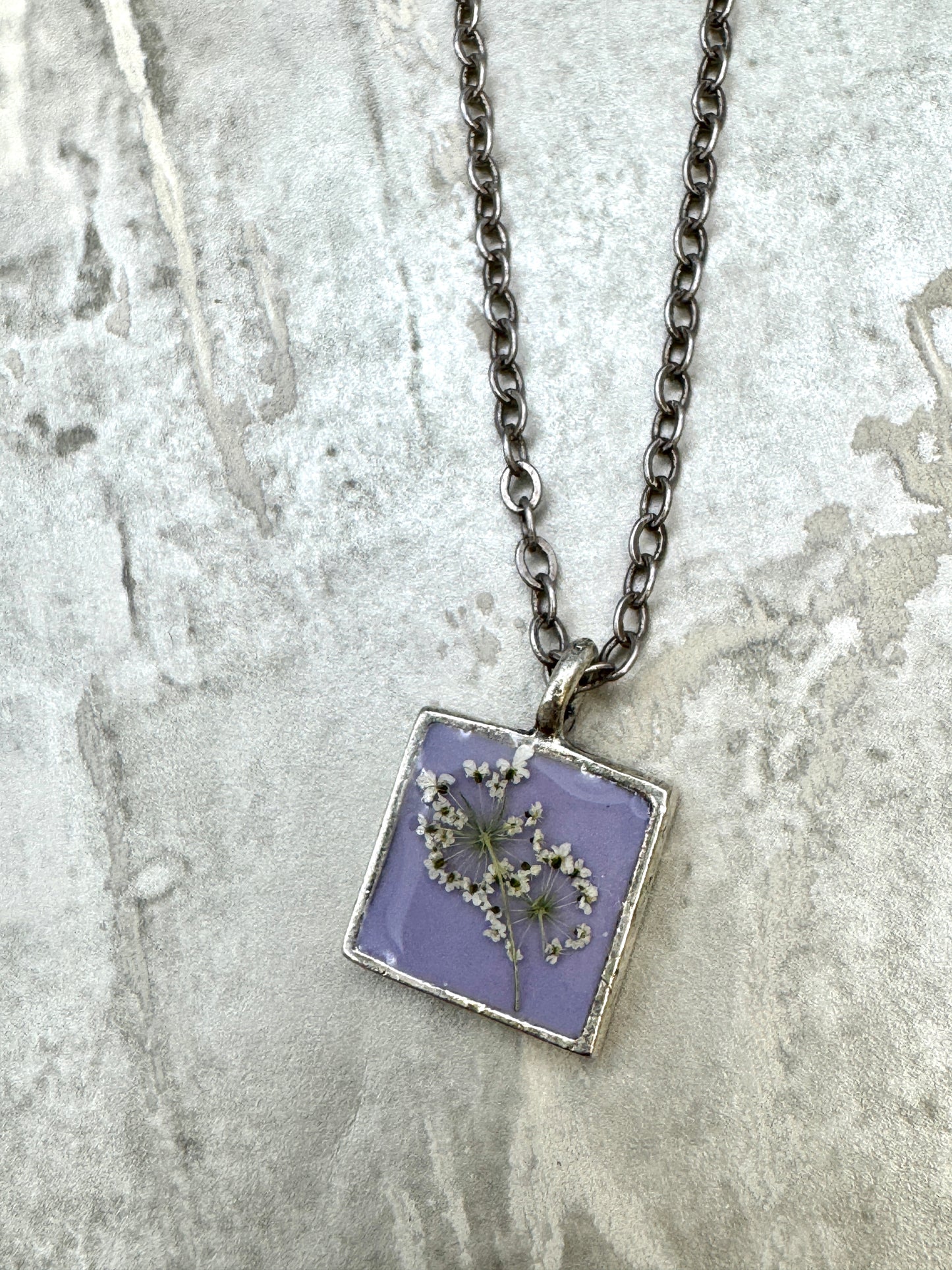 Denise Bush- Encased Flower Silver Necklace