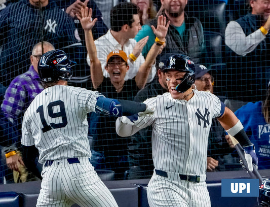 2025-10-08 Judge celebrates with  Ryan McMahon 25RFS63952